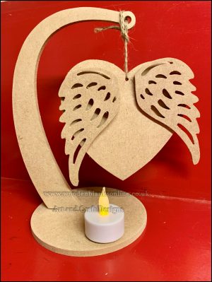 Stand with angel heart and t light