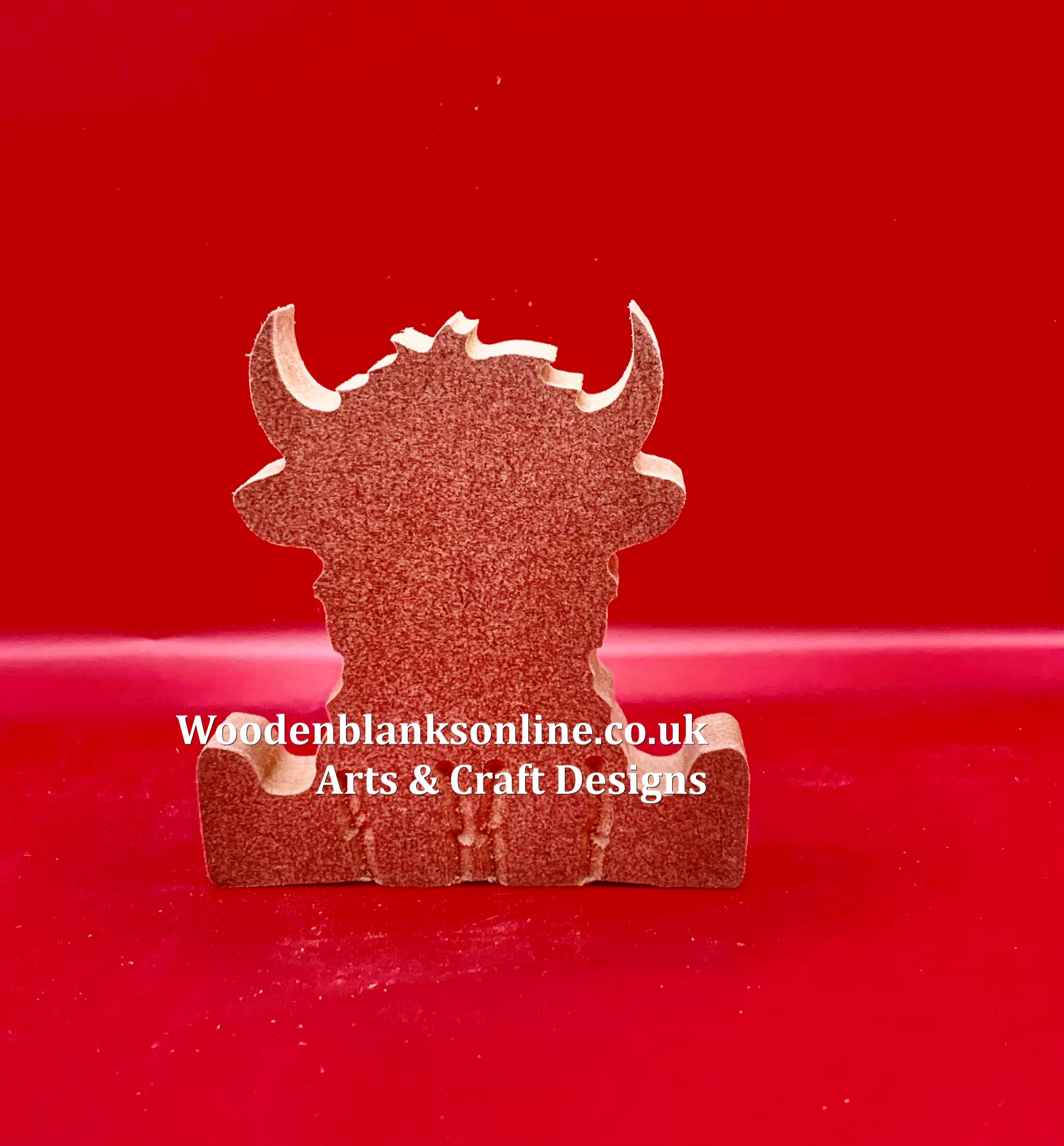 Sitting highland cow in boots small